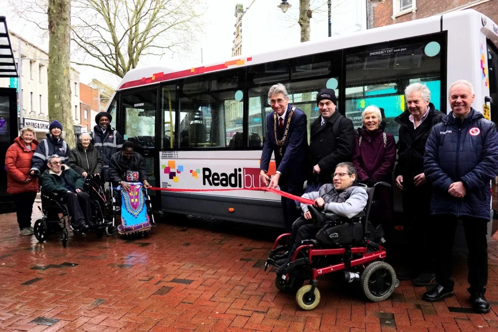 New Orion bus ribbon cutting by councillor Tony Page